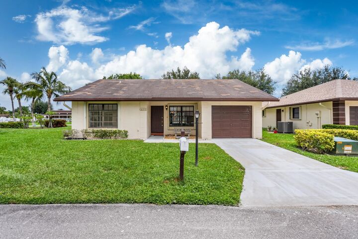 Property Photo: 6315 Tall Cypress Circle FL 33463