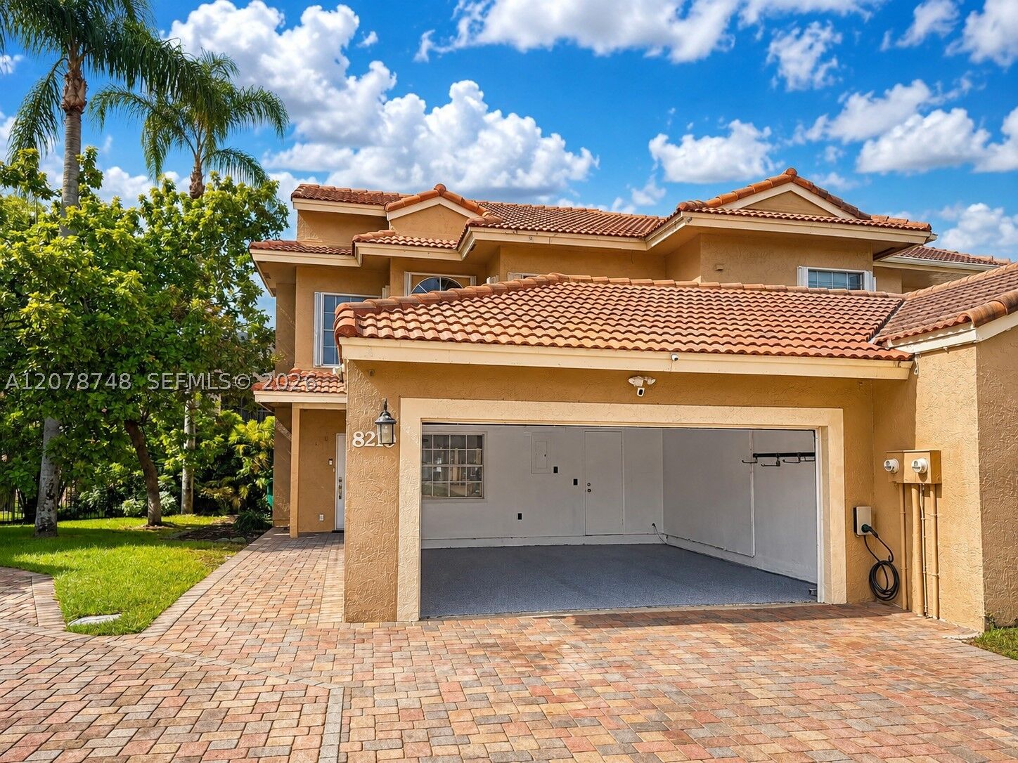 Property Photo:  8210 NW 191st Ln 19L  FL 33015 