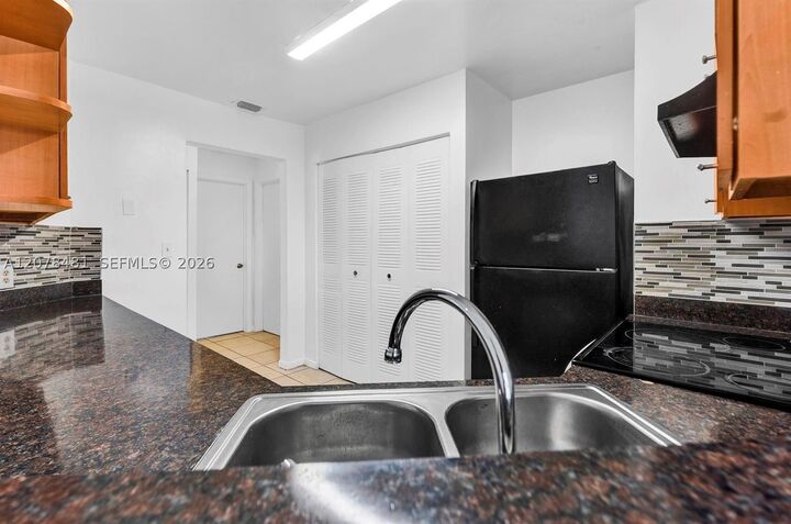 Property Photo:  3449 NW 44th St 205  FL 33309 