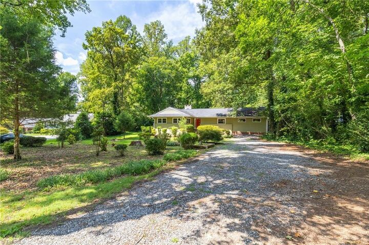 Property Photo: 909 Forest Hill Drive NC 27410