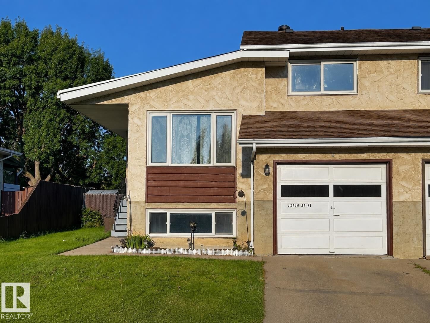 Property Photo:  13110 31 Street NW  AB T5A 3A4 