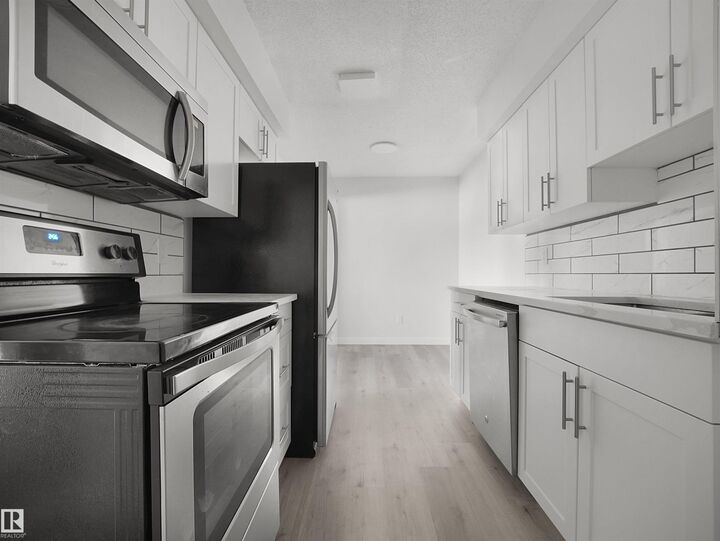 Property Photo:  14220 80 Street NW 6  AB T5C 1L6 