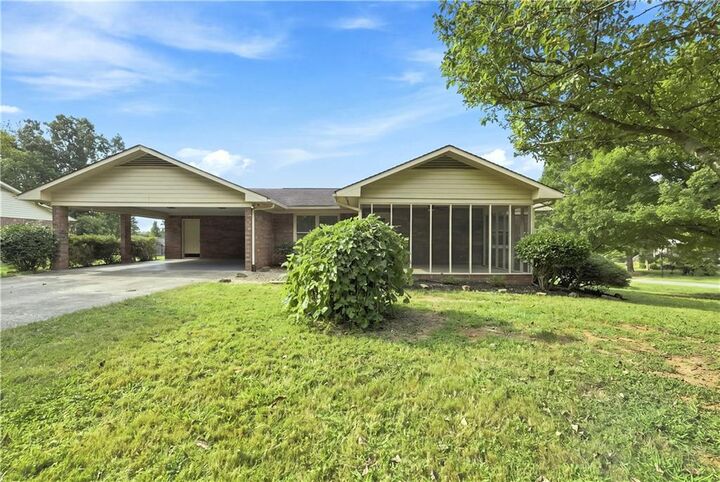 Property Photo:  208 Woodland Circle SE  GA 30701 