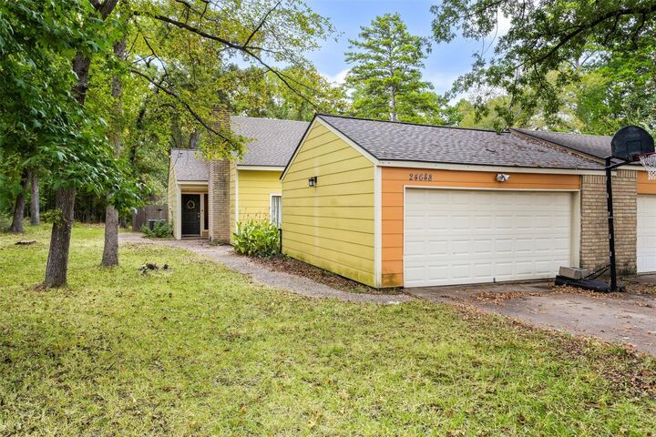 Property Photo: 24648 Pools Creek Drive TX 77320