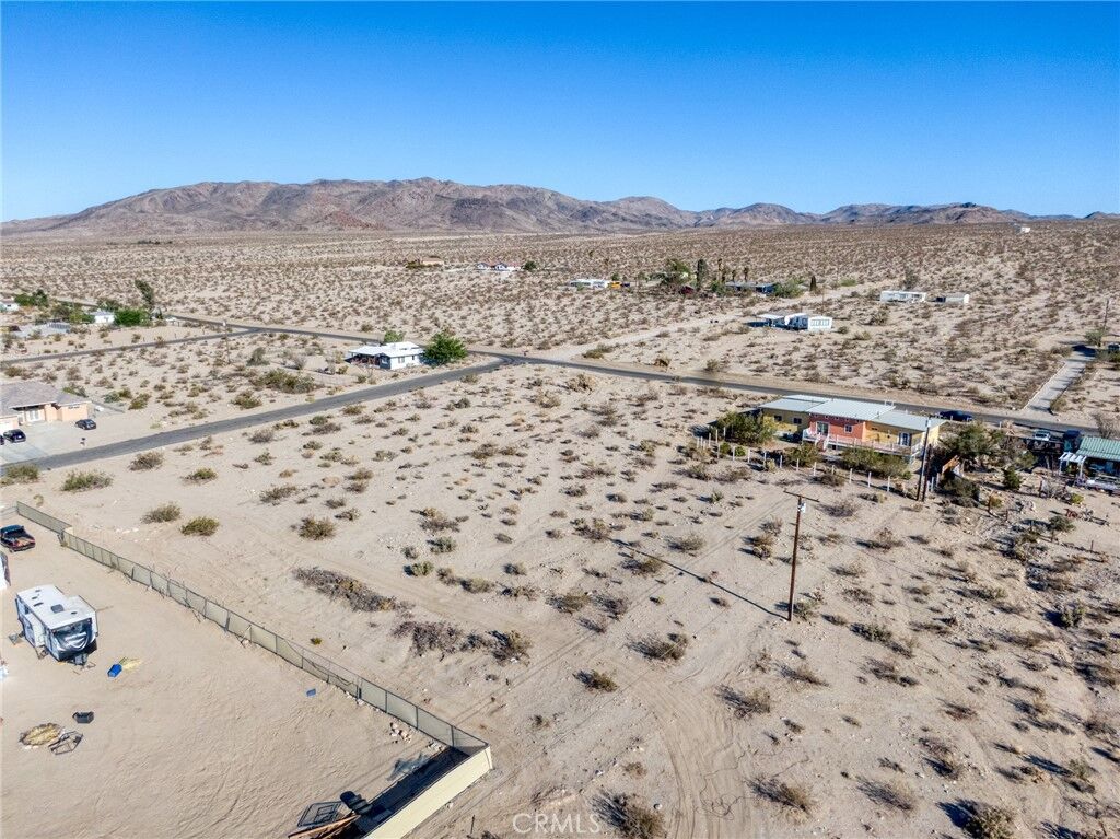 Property Photo:  7694 Araby Ave  CA 92277 
