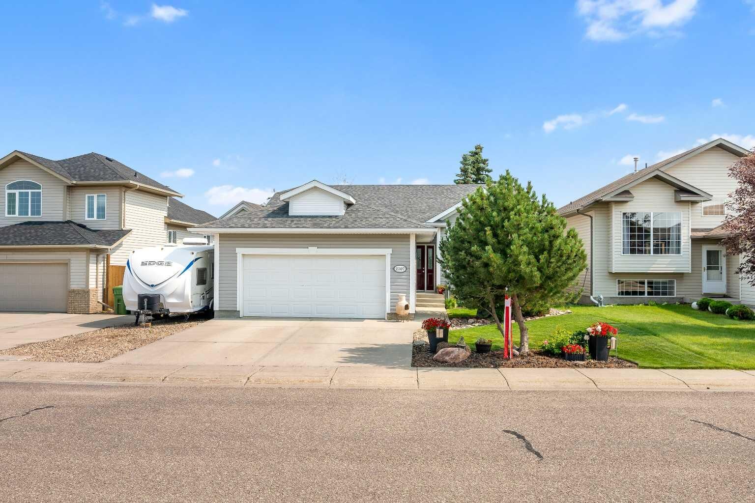 Property Photo:  2307 61A Avenue  AB T9V 3J8 