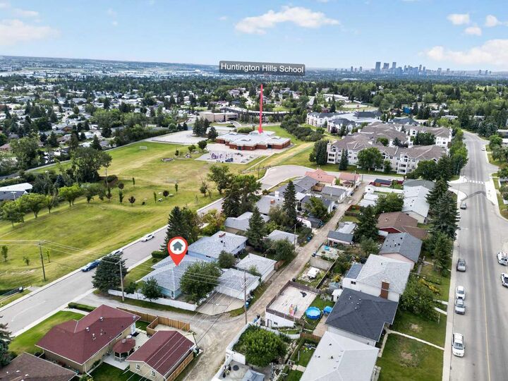 Property Photo: 7035 Huntercrest Road NW AB T2K 4J9
