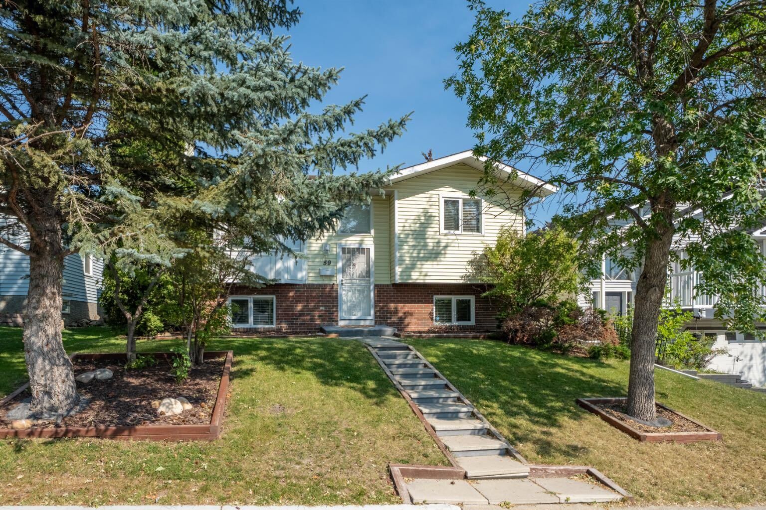 Property Photo: 59 Macewan Park Road NW AB T3K 3G1