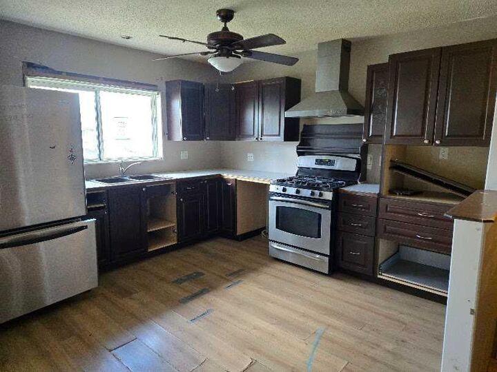 Property Photo:  5008 56 Street  AB T4T 1E8 