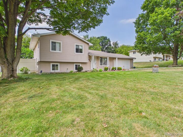 Property Photo: 4411 Huckleberry Circle MI 48421 9703
