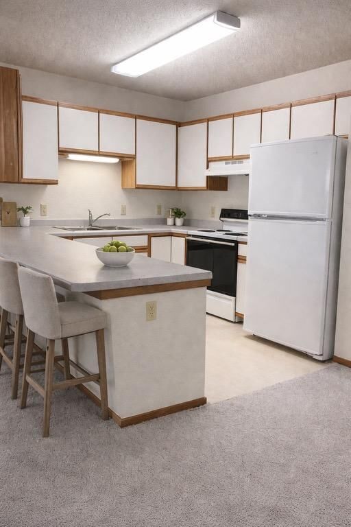 Property Photo: 400 11th Avenue NE 107 MN 56093