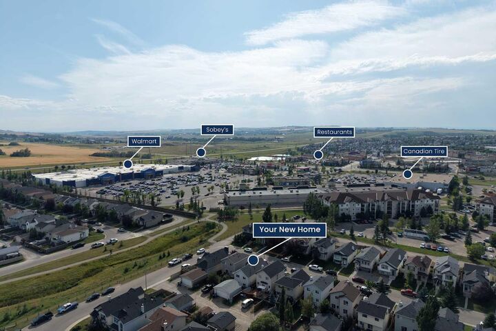 Property Photo:  118 Cimarron Grove Crescent  AB T1S 2E2 