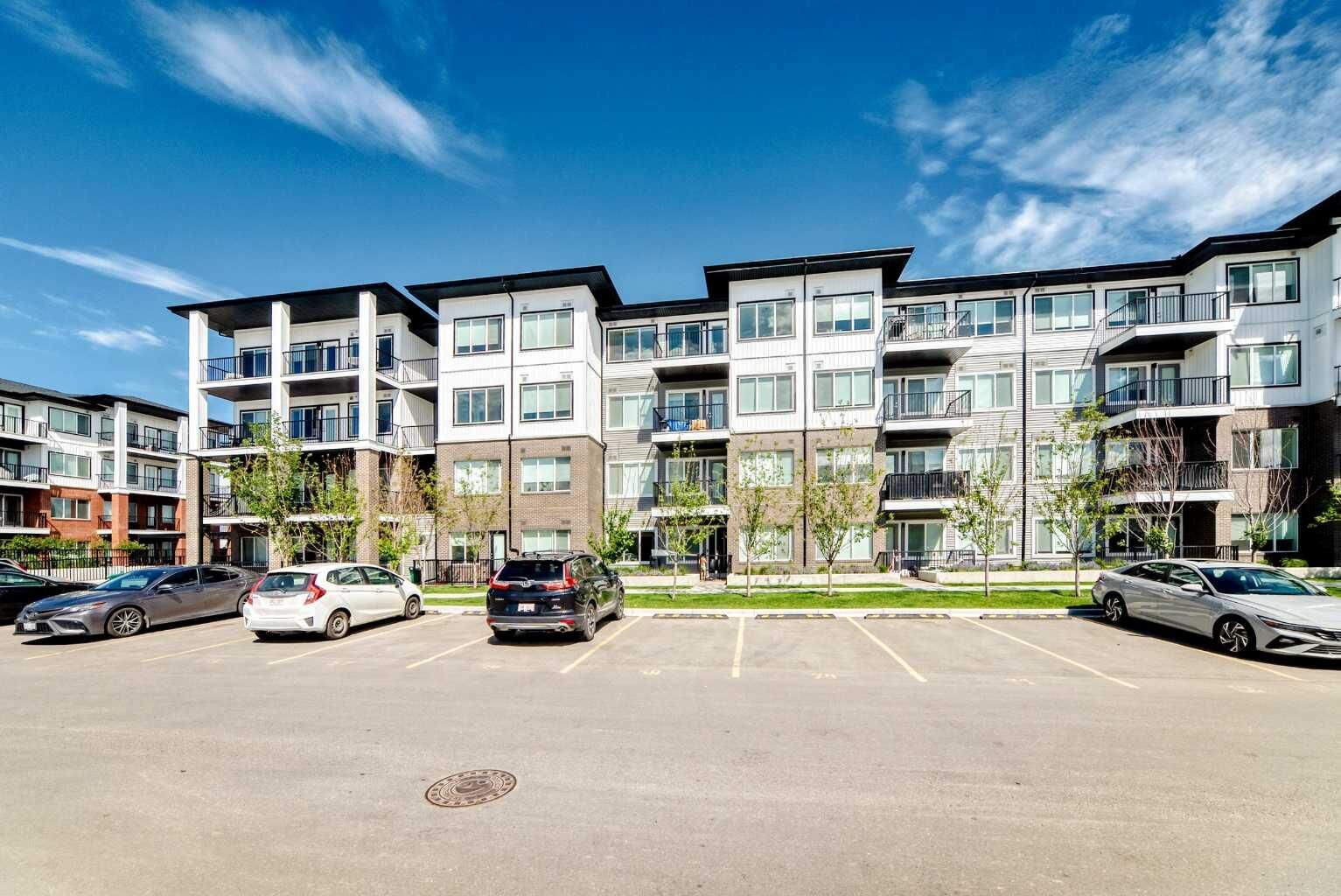 Property Photo:  6 Merganser Drive West 1406  AB T1X 2Y2 