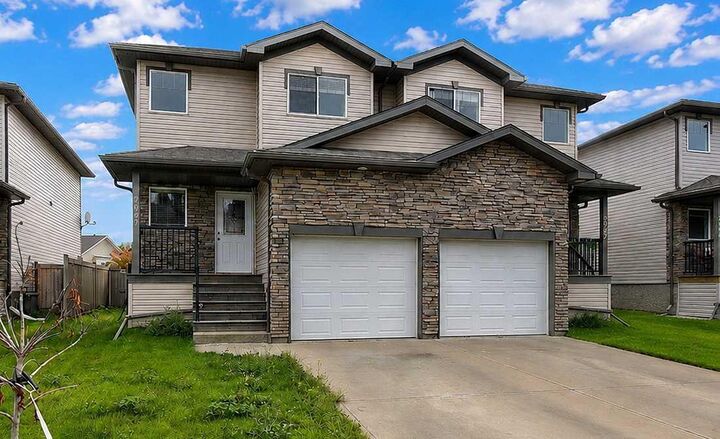 Property Photo:  7027 112 Street  AB T8W 0C8 