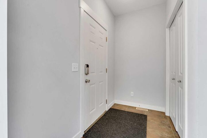 Property Photo: 304 Rainbow Falls Drive AB T1X 0E4