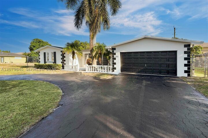 Property Photo: 860 NW 207th St FL 33169