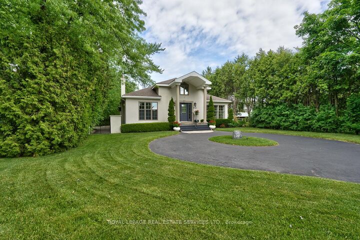 Property Photo:  3423 Lakeshore Road  ON L7N 1B5 