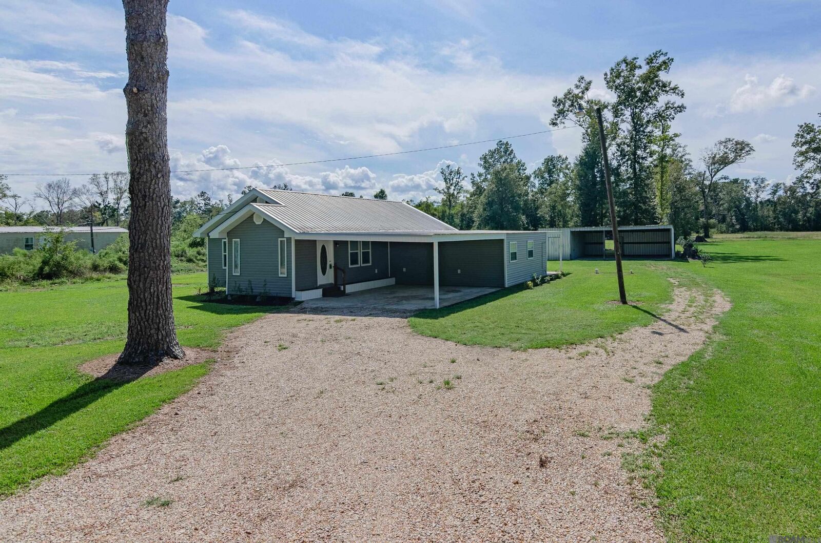 Property Photo:  15687 Penalber Rd  LA 70449 