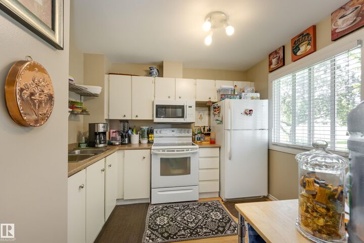 Property Photo:  9619 180 Street NW 14  AB T5T 4L9 
