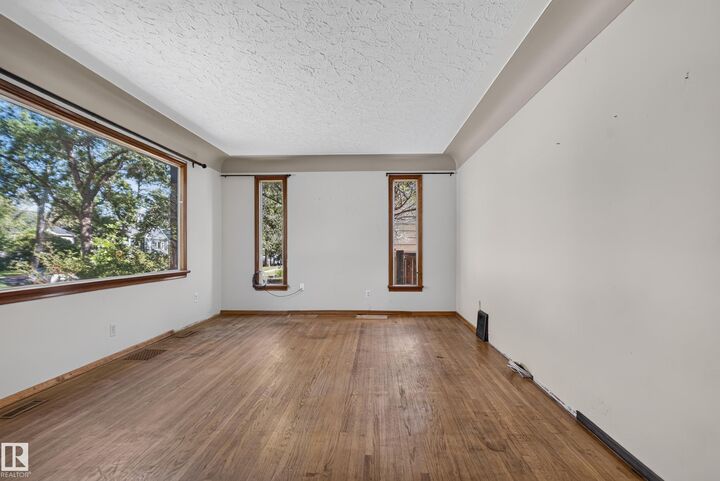 Property Photo:  13351 109A Avenue NW  AB T5M 2J5 