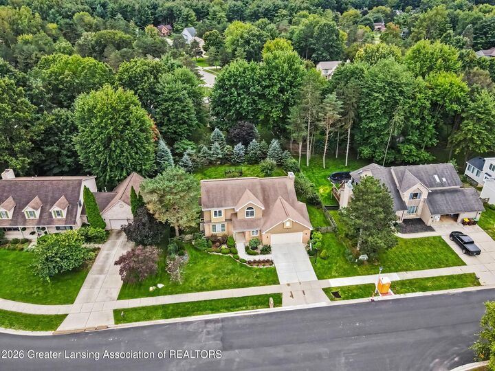 Property Photo:  1199 Leeward Drive  MI 48864 