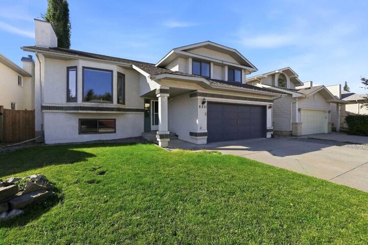 Property Photo:  5711 61 Avenue  AB T4T 1J2 
