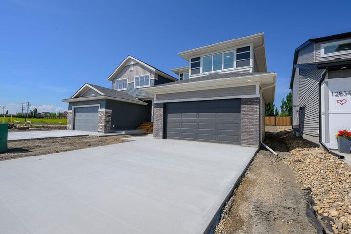 Property Photo:  8721 128 Avenue  AB T8X 0X7 