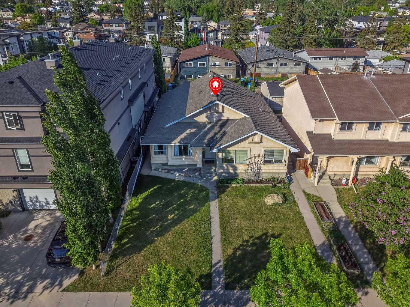 Property Photo:  4736 17 Avenue NW  AB T3B 0P5 