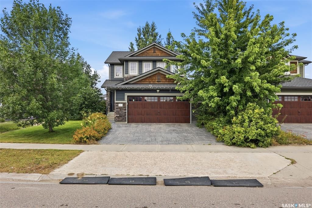 Property Photo: 411 Hartley Road SK S7T 0E7