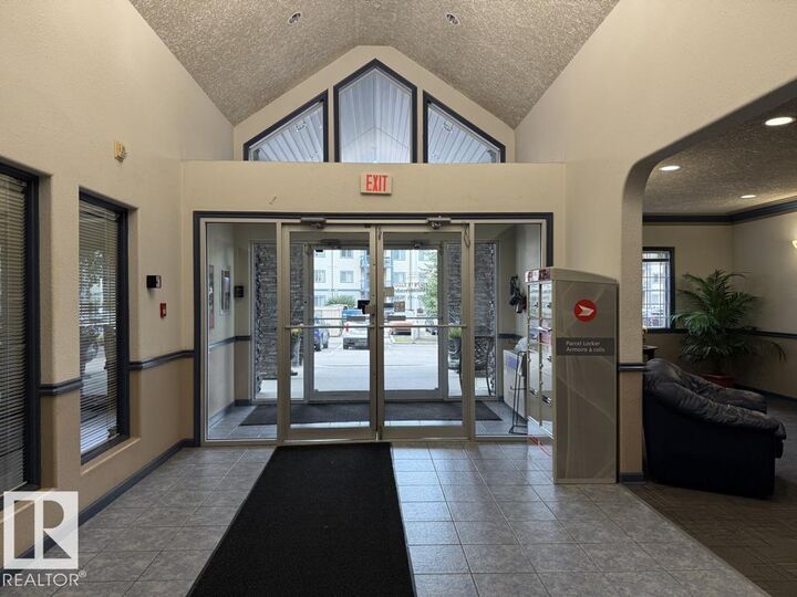 Property Photo:  16303 95 Street NW 316  AB T5Z 3V1 