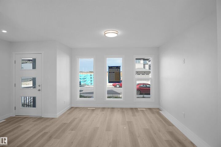 Property Photo:  7395 Keeler Crescent SW  AB T6W 4J9 