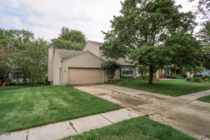 Property Photo: 5618 Bearcreek Drive MI 48917