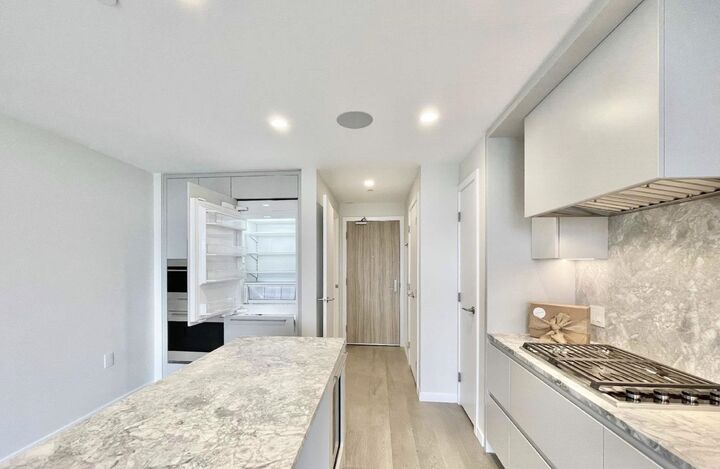 Property Photo:  7433 Cambie Street 1402  BC V6P 0J8 