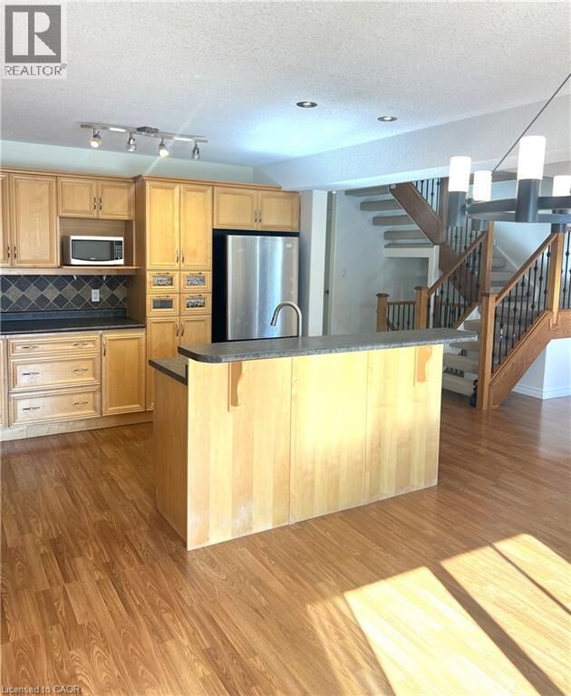 Property Photo:  98 Snow Goose Crescent  ON N3B 3M5 