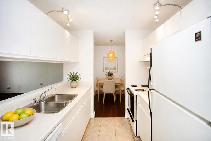 Property Photo:  10636 120 Street NW 309  AB T5H 4L5 