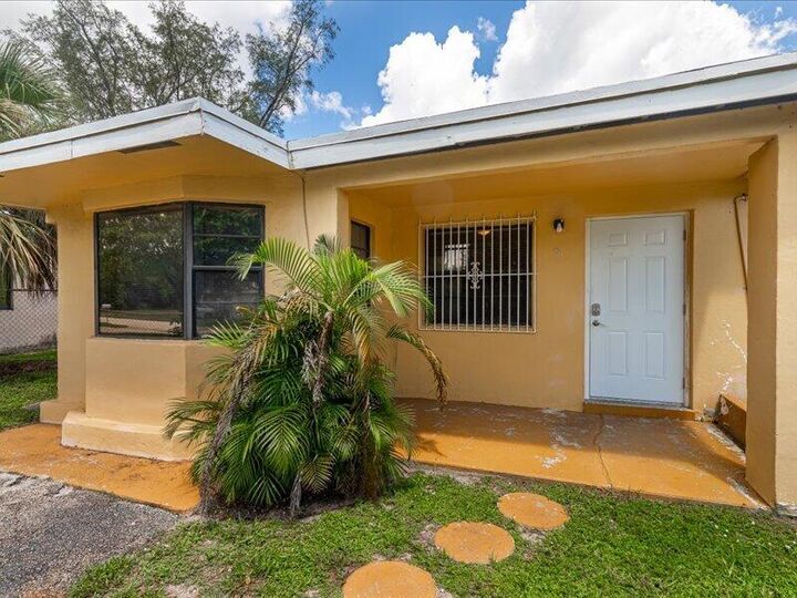 Property Photo:  91 NE 6th Court  FL 33441 