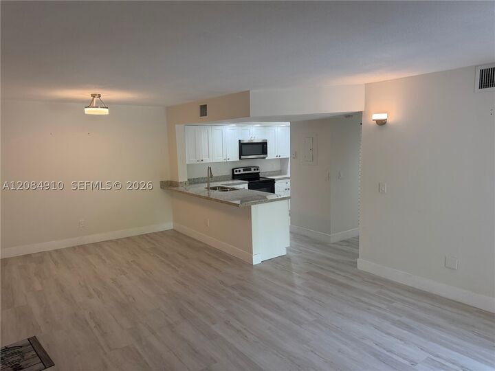 Property Photo: 18840 NW 57th Ave 207 FL 33015