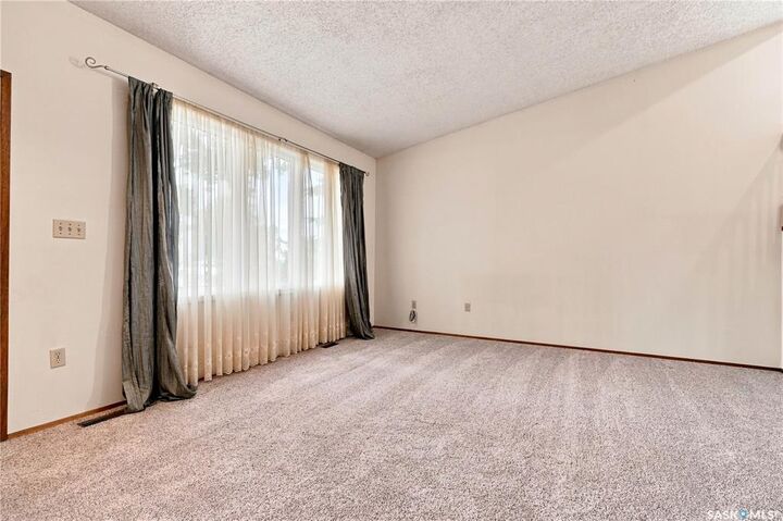 Property Photo:  302 Nemeiben Road  SK S7J 4S7 