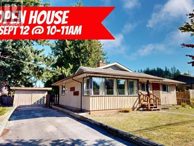Property Photo:  7139 Barnet Street  BC V8A 1Z9 