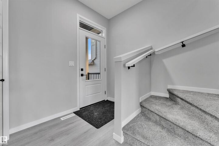Property Photo:  16832 49 Street NW  AB T5Y 4G9 