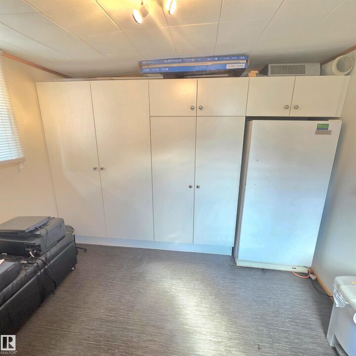 Property Photo:  #8 5002 56 Avenue  AB T7A 1M5 