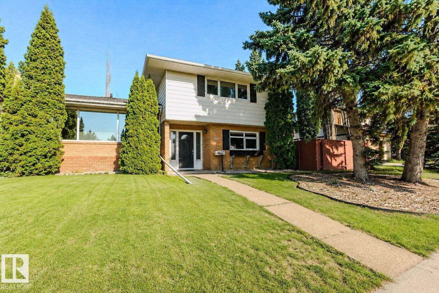 Property Photo:  3911 117 Street NW  AB T6J 1S8 