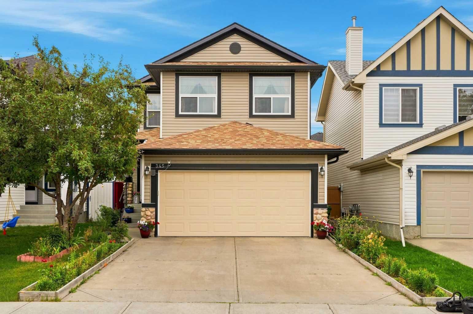 Property Photo:  345 Saddlecrest Way NE  AB T3J 5N6 