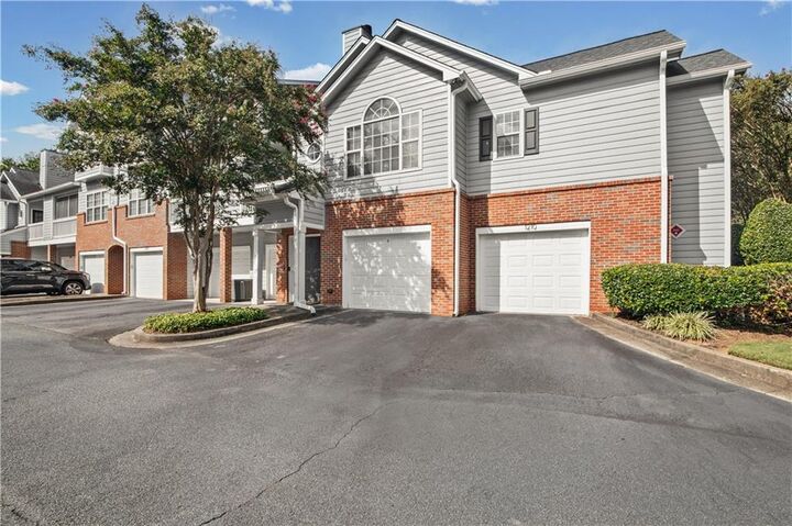 Property Photo: 1209 Vinings Forest Lane SE 12 GA 30080