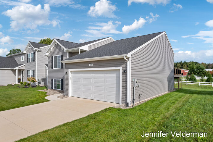 Property Photo:  331 N Tannenbaum Trail  MI 49319 