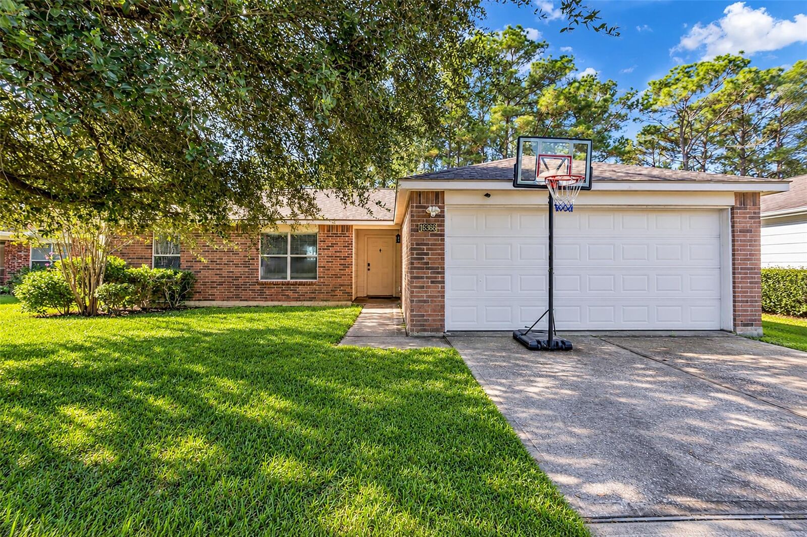 Property Photo: 16368 Many Trees Lane TX 77302