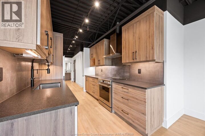 Property Photo:  3850 Dougall 209  ON N9G 1X2 