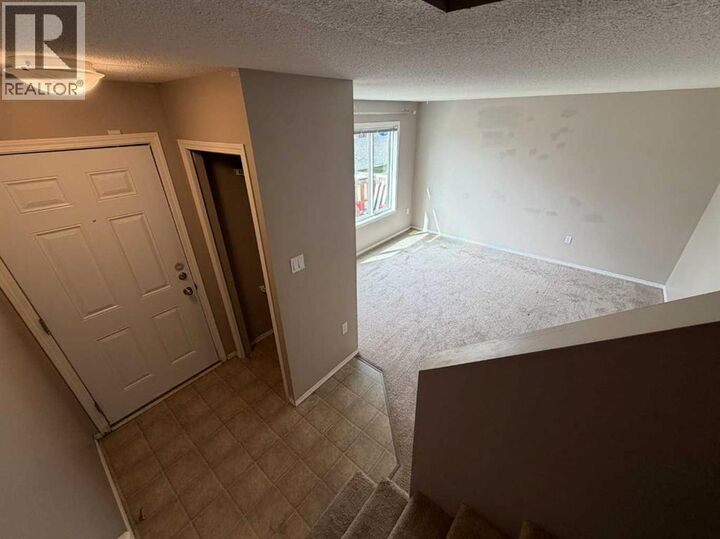Property Photo:  5105 54 Street  AB T1G 1N1 