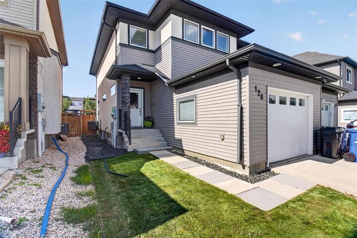 Property Photo: 128 Larry Vickar Drive MB R3W 0K4