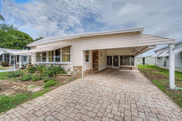 Property Photo:  39820 US Highway 19 N 106  FL 34689 
